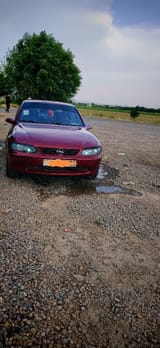 Opel Vectra B 1996 — фото 1 из 11