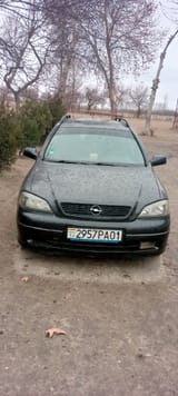 Opel Astra G 1999 — фото 1 из 9